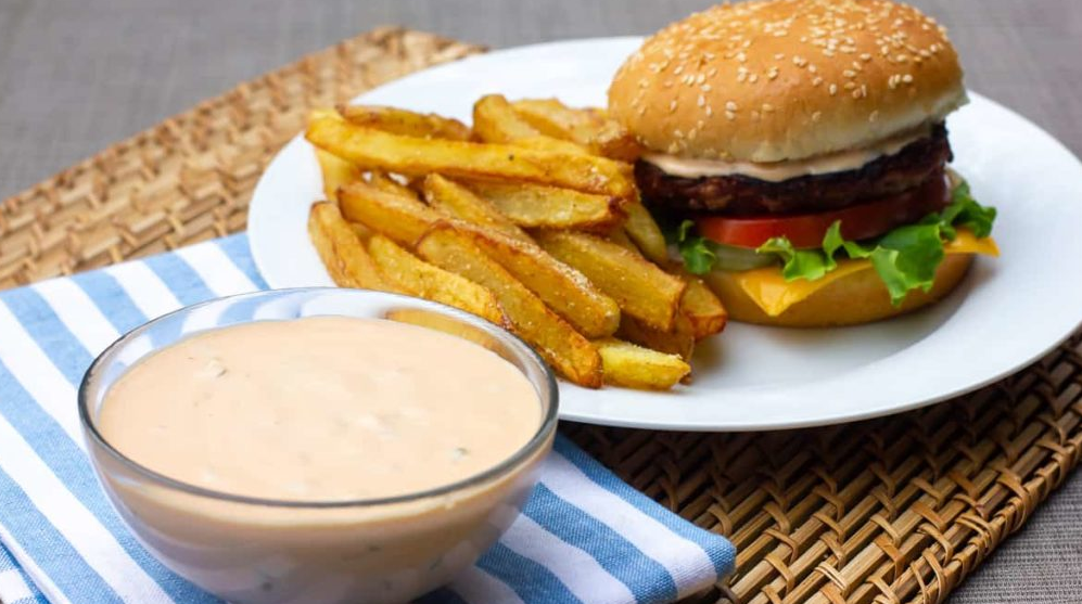 Homemade Big Mac Sauce in a glass bowl on a plate, ready to serve