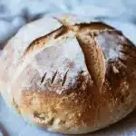 Freshly baked gluten-free sourdough bread on a table