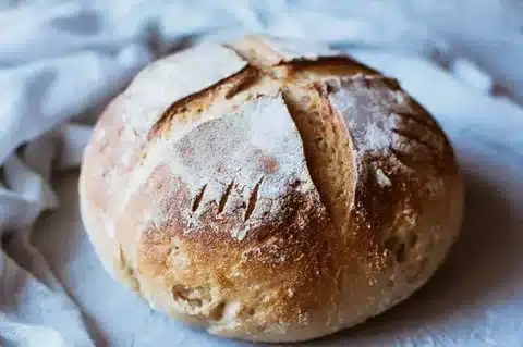 Freshly baked gluten-free sourdough bread on a table